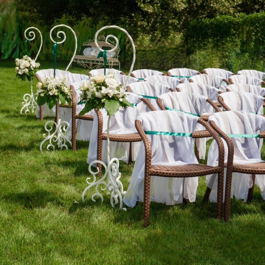 Beautifully decorated wedding reception outdoors. Wedding decor.